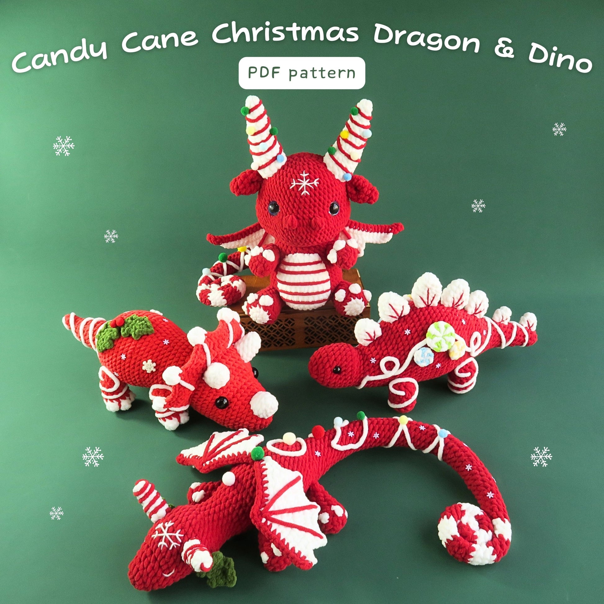 Crocheted dragon and dinosaur toys in candy cane theme on a green background