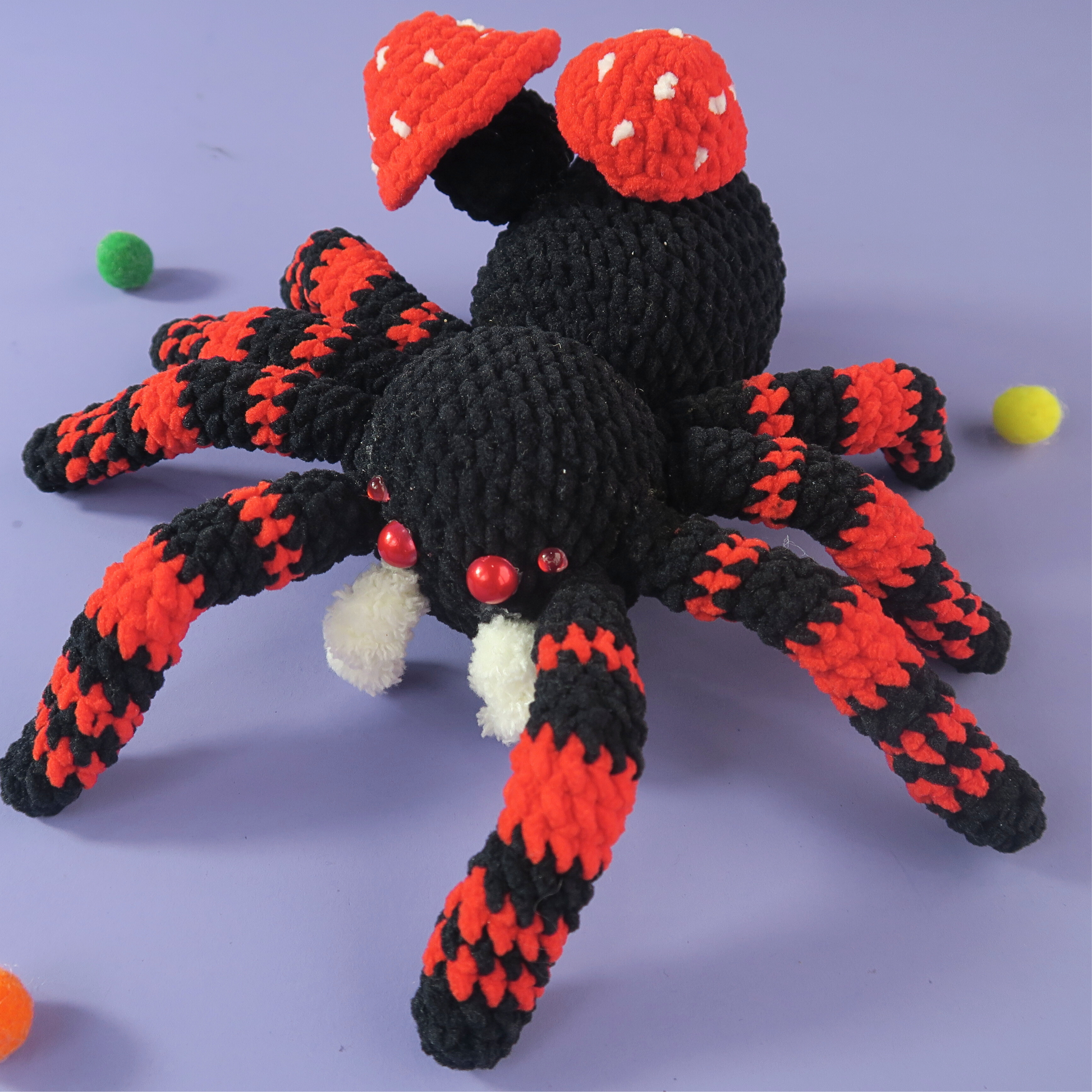 Mushroom Halloween Spider Crochet pattern on a purple background