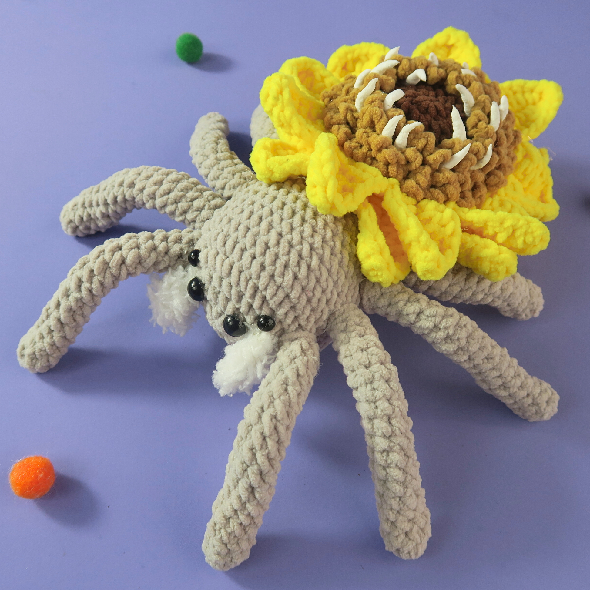 Sunflower Halloween Spider Crocheted on a purple background