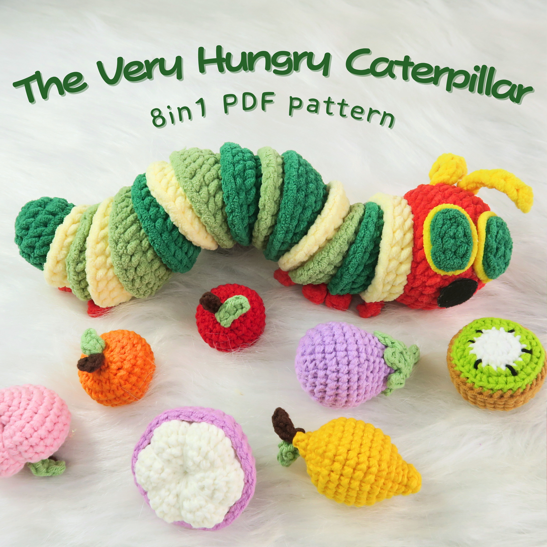 Crocheted caterpillar and fruits on a white background with text 'The Very Hungry Caterpillar 8in1 PDF pattern'.
