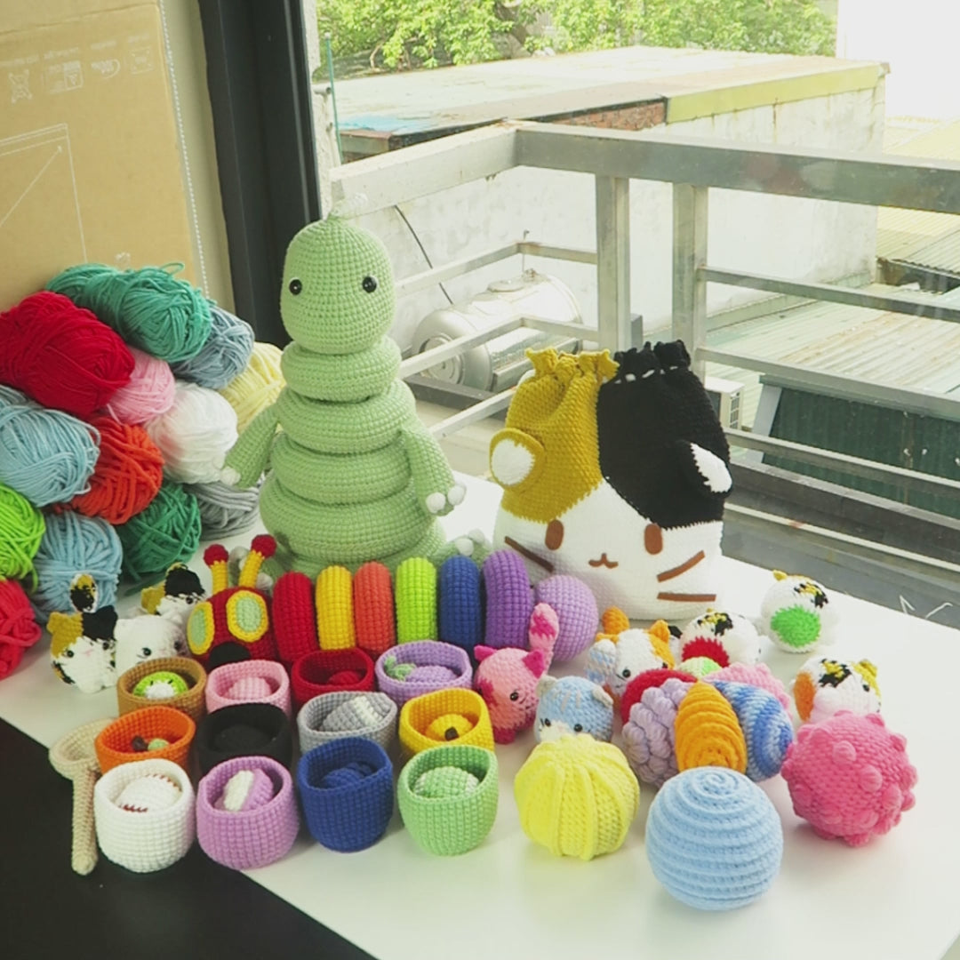 Crochet 5 adorable toys in one bundle video. Includes Montessori sensory balls, dinosaur & caterpillar stacking toys, cat memory game, and fruit color sorting set. Beginner-friendly patterns, perfect for gifts & play.
